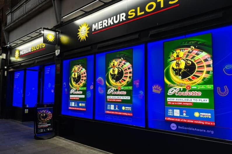 Merkur Draws UK MPs Ire Over Staff Bonuses Tied to Gambler Losses