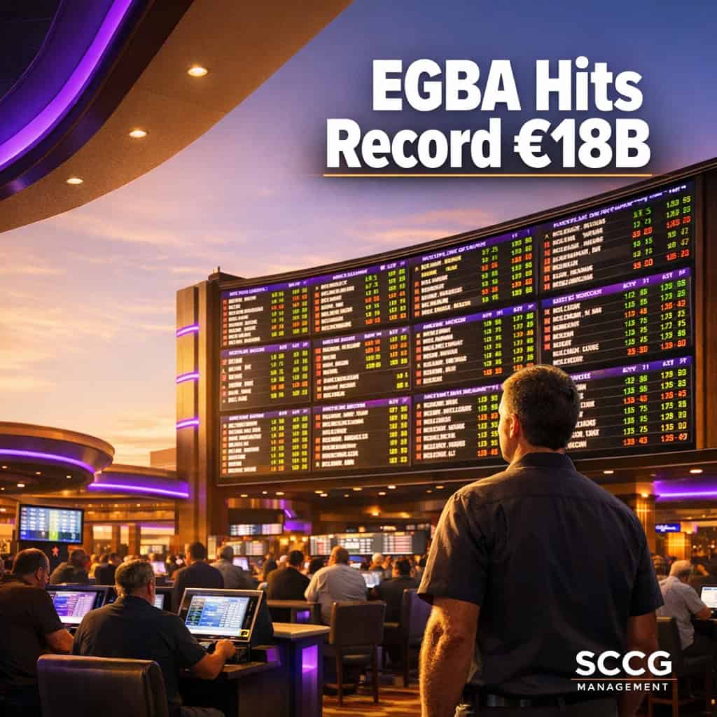 Large glowing sportsbook odds board above a busy casino floor with active betting terminals and patrons.