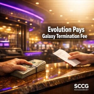 Casino cage cash desk mid-transaction with thick stack of bills being counted under bright directional light on a lively gaming floor.