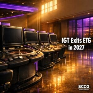 Row of powered-down IGT electronic table game units standing idle on a brightly lit empty casino floor signaling the 2027 division closure.